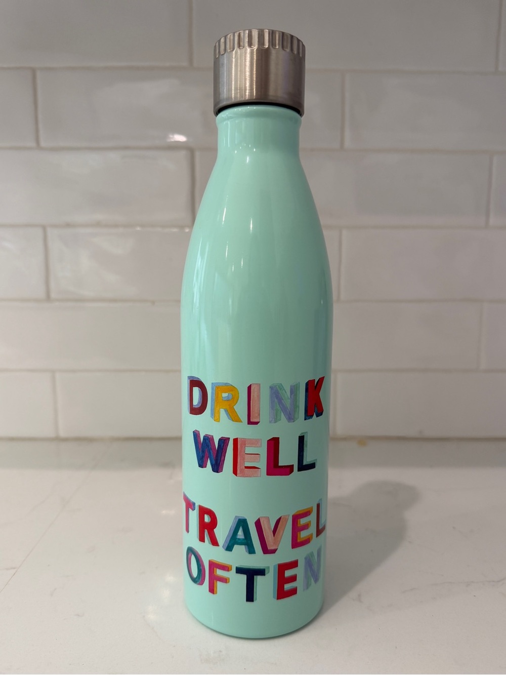 NWOT Aqua Stainless Bottle with 'Drink Well Travel Often' Lettering